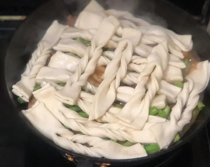 排骨扁豆焖卷子 第 11 步