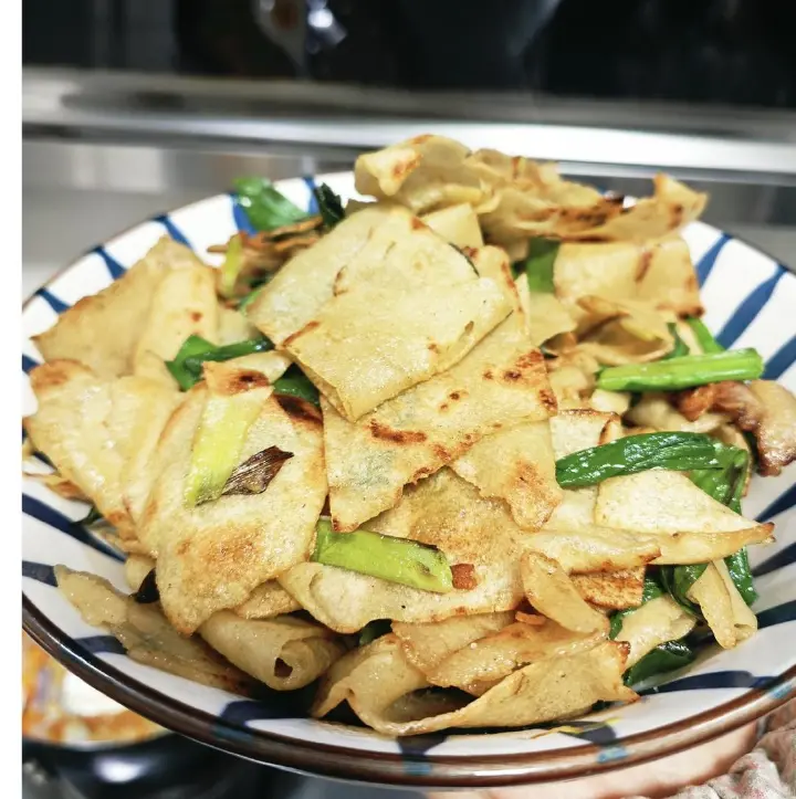 腊肉炒枯豆丝 第 7 步