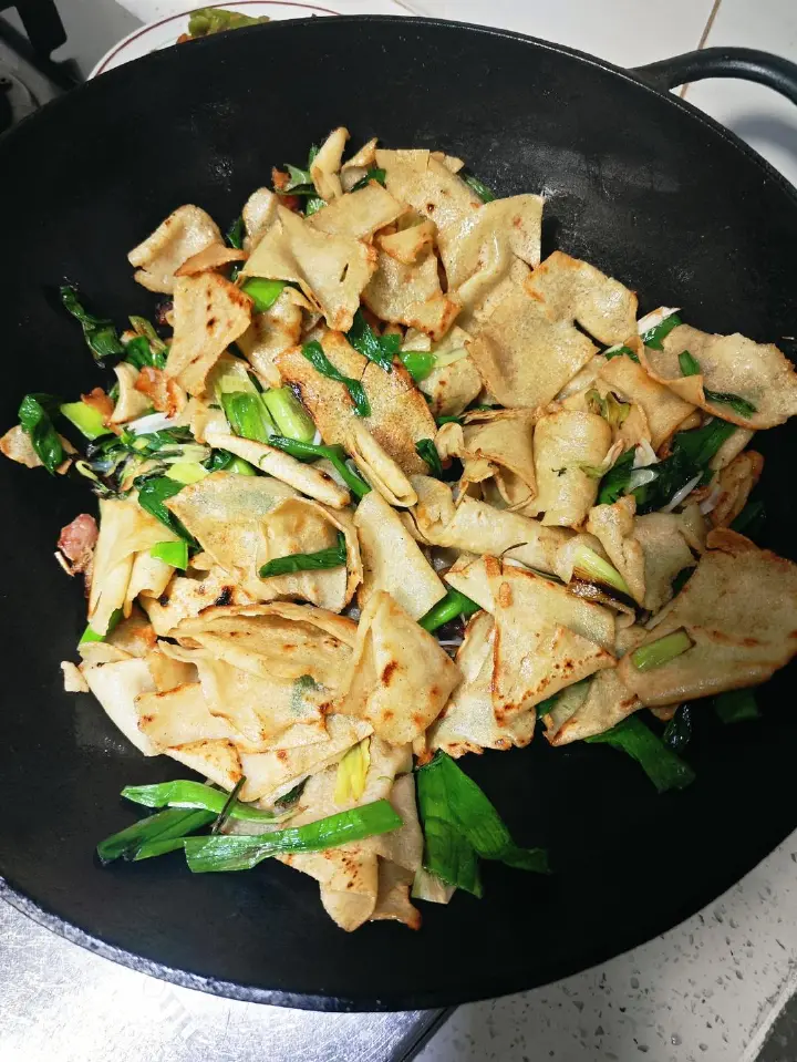 腊肉炒枯豆丝 第 6 步