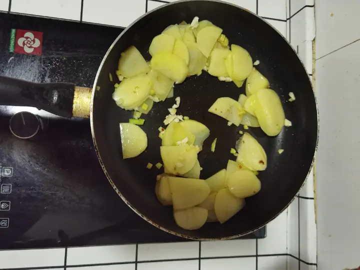 土豆片炒肉 第 7 步