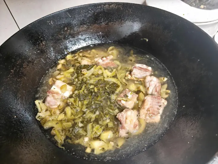 酸菜粉丝炖排骨 第 5 步
