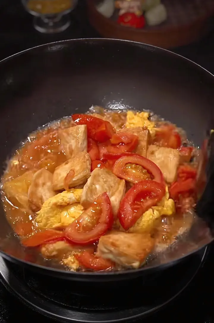 西红柿焖豆腐 第 10 步