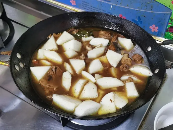 白萝卜焖鸭 第 10 步