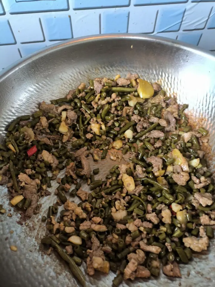 酸豆角炒肉 第 9 步