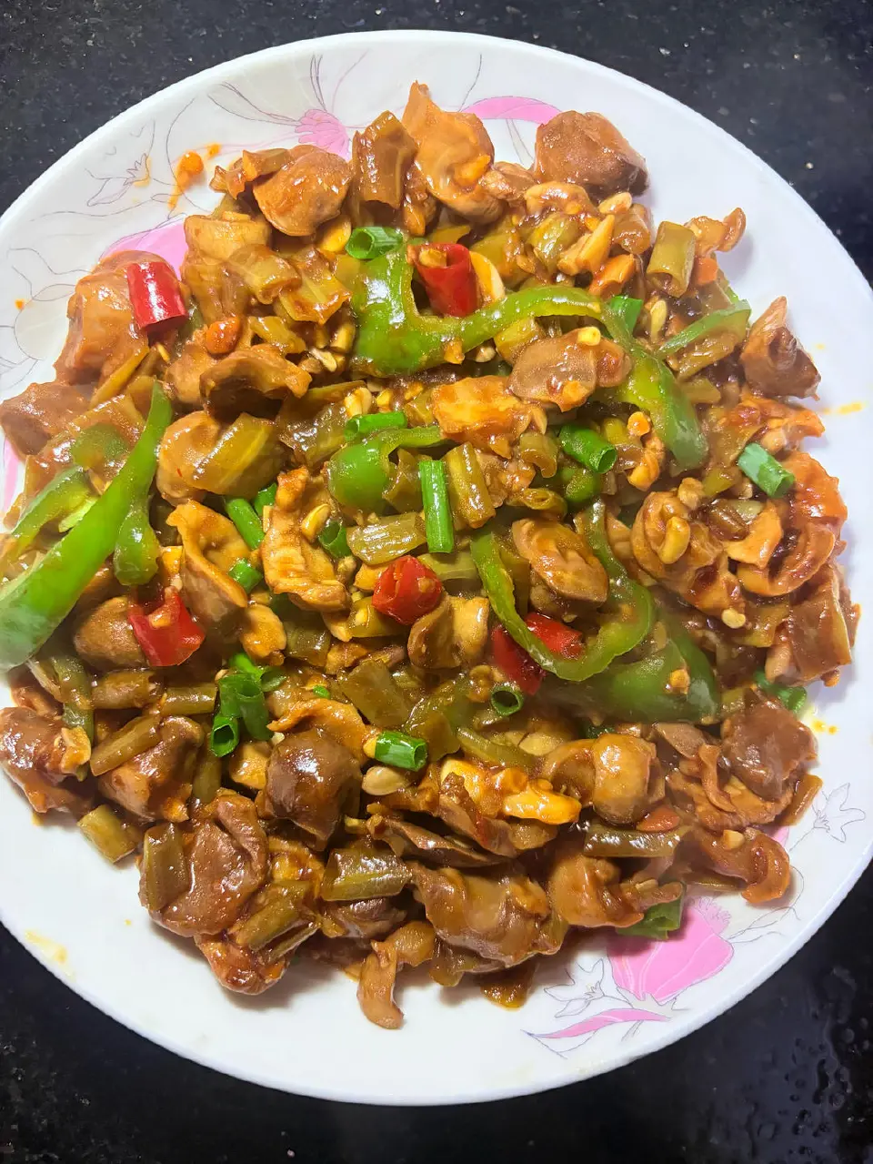 酸豆角炒鸡胗成品图