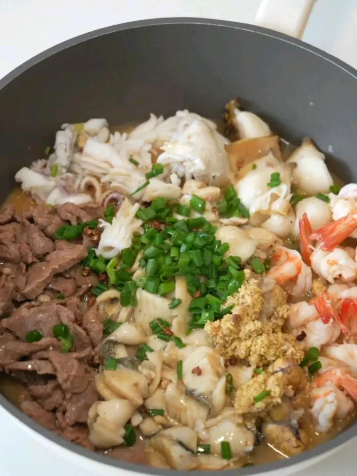 水煮海鲜牛肉 第 7 步