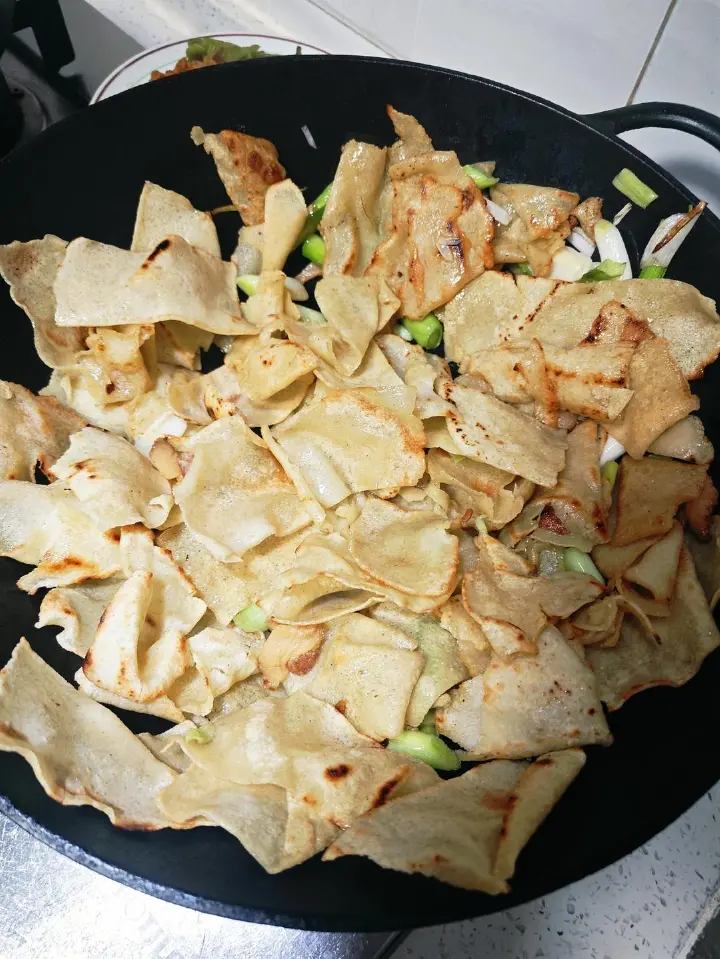 腊肉炒枯豆丝 第 4 步